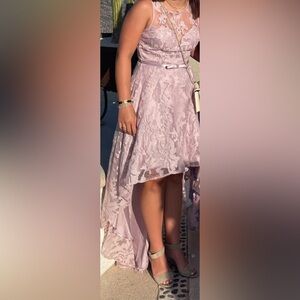 Cute evening dress, worn once.  Tapered hem, silk lined over mauve lace. Size M